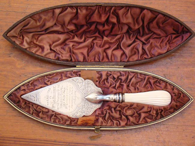 A Victorian ivory handled sterling silver presentation trowel dated 1891 in its' original fitted case